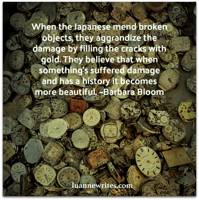 Japanese quote about broken objects on background of broken watch faces