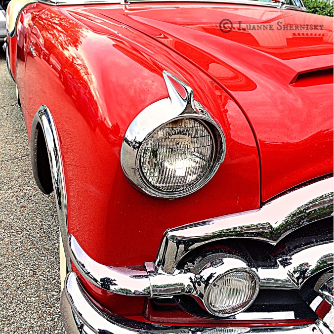 Close up headlight of antique car